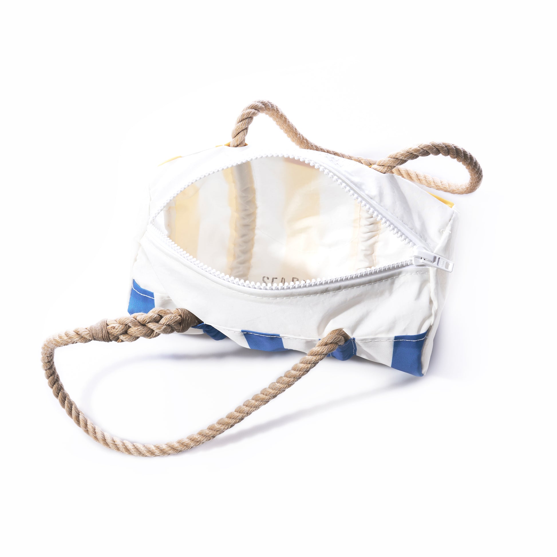 The Sun  Sea Stripe Baguette Bag by Sea Bags, featuring white and blue nautical stripes and rope handles, sits open on a white background, revealing its empty interior and zipper closure. by Sea Bags