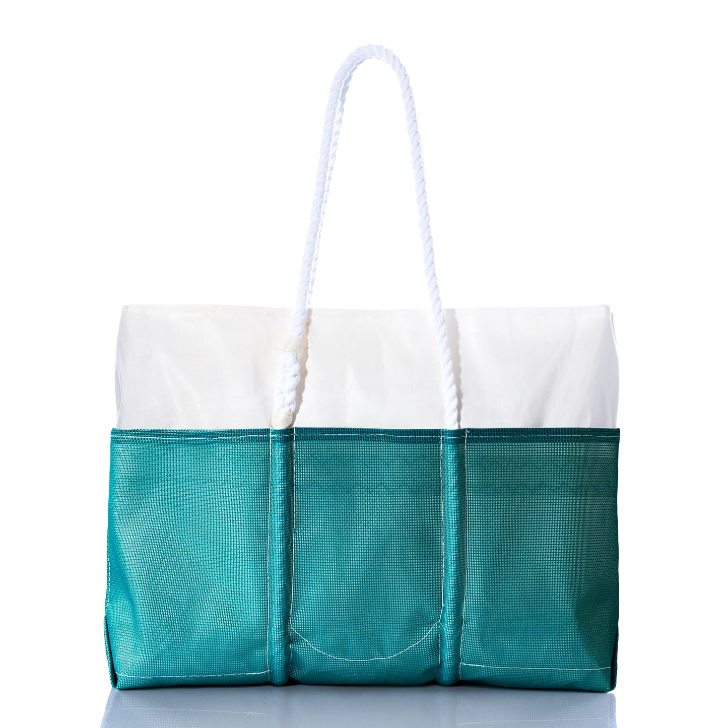 The Sea Bags Ocean Teal Beachcomber Tote is a teal and white sand-proof beach bag featuring three exterior pockets and two white rope handles, shown against a white background. by Sea Bags