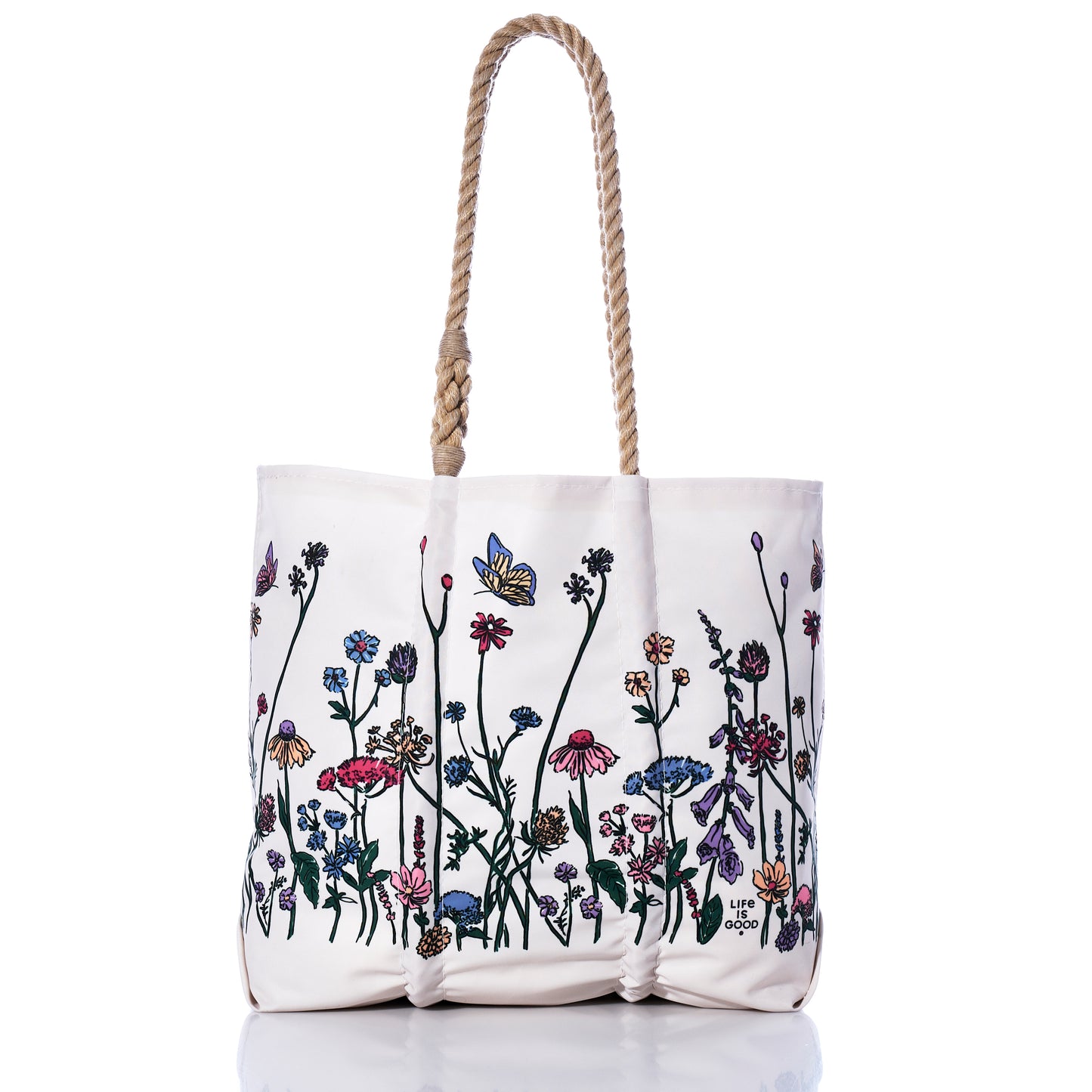 Sea Bags Life is Good Wildflowers Medium Tote, handcrafted in Maine from recycled sail bag materials, features rope handles and a vibrant wildflower and butterfly print along the bottom half, shown on a white background. by Sea Bags
