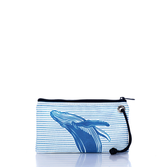 Introducing the Whale Watch Wristlet by Sea Bags—a rectangular zippered pouch handcrafted in Maine from recycled sailcloth. This stylish wristlet features a blue whale illustration with horizontal blue stripes and includes a black strap on the right side, making it perfect for your next adventure. by Sea Bags