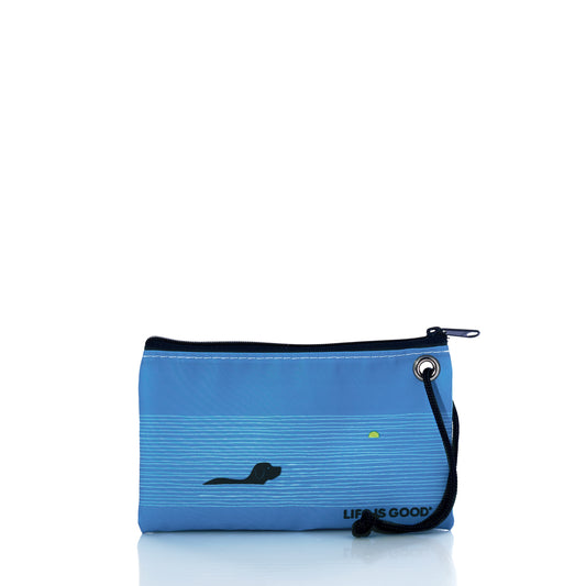 Carry your essentials in style with the Life is Good Dog Days Wristlet by Sea Bags—a blue zippered pouch with a black wrist strap, adorned with a minimalist black dachshund, a yellow sun, and the phrase Life is Good in the corner. This chic and practical accessory is perfect for everyday use. by Sea Bags