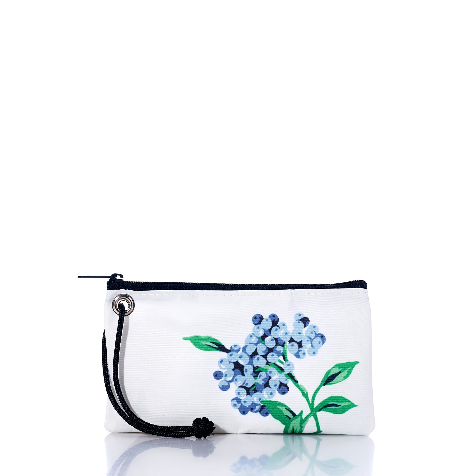 The Blueberry Print Wristlet by Sea Bags is a white zippered pouch with a black wrist strap, crafted from recycled sail cloth and featuring a printed design of Maine blueberries and green leaves on the front. by Sea Bags