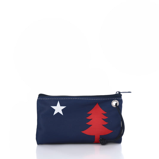 The 250th Patriotic Pine Wristlet by Sea Bags is a small navy blue zippered pouch, crafted from recycled sailcloth and adorned with a white star and red pine tree design—perfect as a patriotic bag or Maine wristlet, shown here against a white background. by Sea Bags