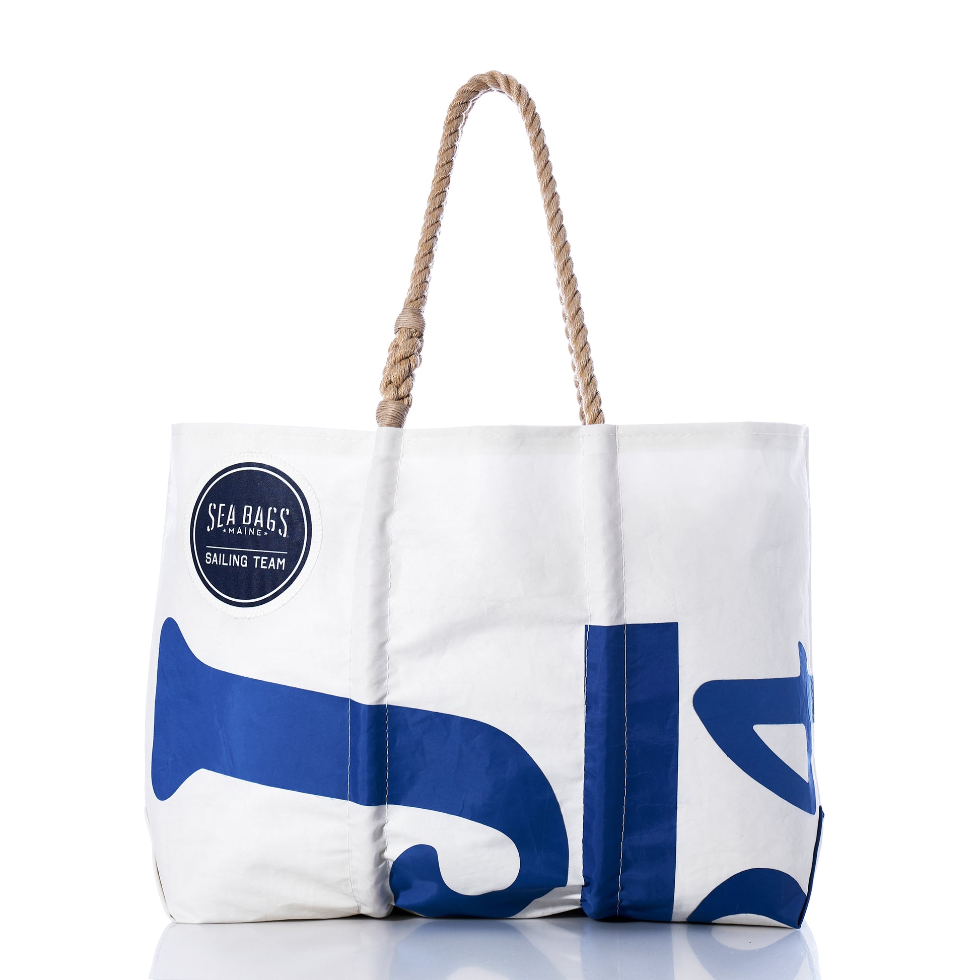 Race Day Vintage J24 Large Tote by Sea Bags, crafted from recycled sail material with blue designs and a sturdy rope handle. Features a SEA BAGS SAILING TEAM logo patch on the upper left corner. Photographed on a white background. by Sea Bags