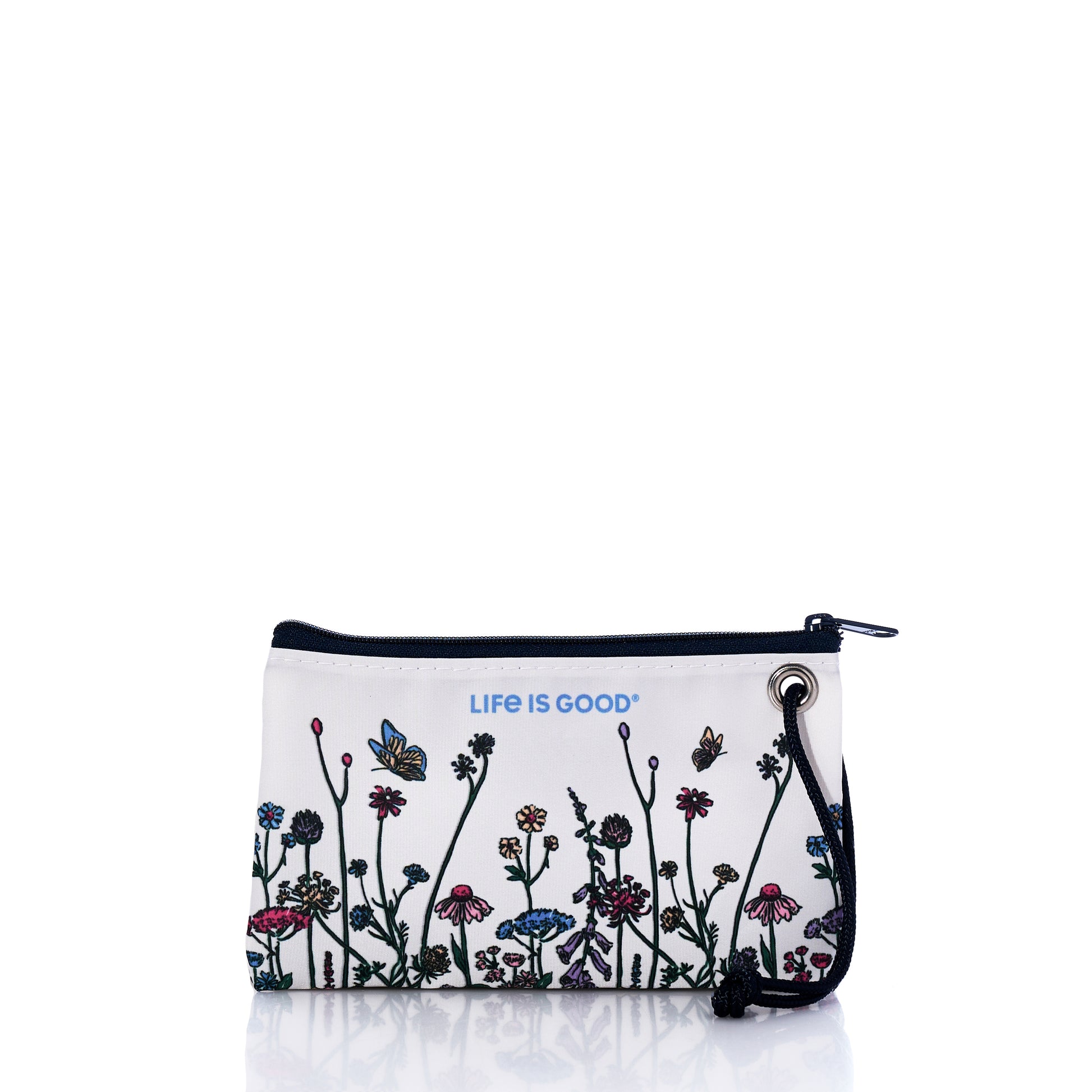 The Sea Bags Life is Good Wildflowers Wristlet features a white zippered pouch with a black strap, beautifully adorned with colorful wildflowers and butterflies. “Life is Good” is printed in blue near the top. Handcrafted in Maine, this stylish accessory blends sustainability with charm. by Sea Bags