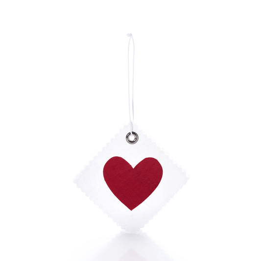 Introducing the Sea Bags Heart Sail Cloth Gift Tag: a square gift tag crafted from recycled white sail cloth, adorned with a red heart at the center. It features a metal-reinforced hole and comes with a white string for hanging, shown here against a plain white background. by Sea Bags