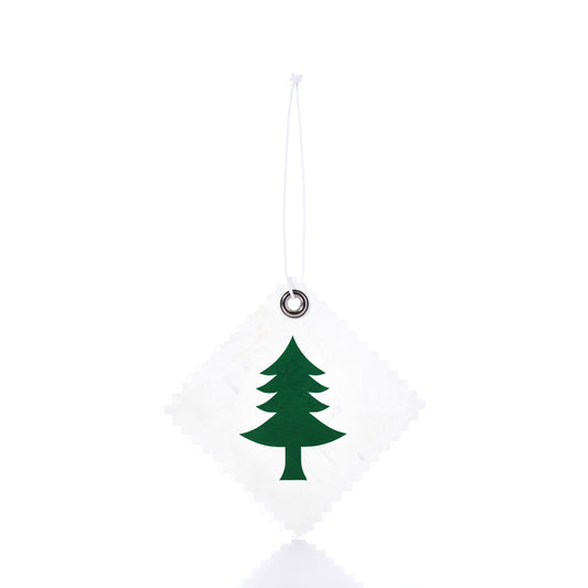 The Sea Bags Pine Tree Sail Cloth Gift Tag is a square, white gift tag featuring a green pine tree graphic and hanging from a white string against a white background—an eco-friendly choice that makes both a sustainable gift and a unique pine tree-themed gift tag. by Sea Bags
