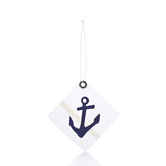 Introducing the Navy Anchor Sail Cloth Gift Tag by Sea Bags—a white, square-shaped tag upcycled from recycled sailcloth, featuring zigzag edges, a navy blue anchor graphic, and a diagonal beige stripe. It hangs from a white string, making it perfect for sustainable gift wrapping or as an anchor bag charm. by Sea Bags