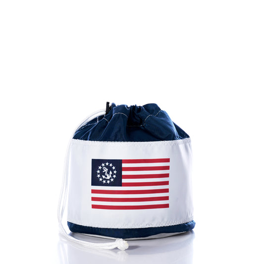 The Sea Bags U.S. Yacht Ensign Ditty Bag is a small drawstring bag featuring a Betsy Ross American flag design on white fabric, handcrafted with sustainable craftsmanship and photographed against a white background. by Sea Bags