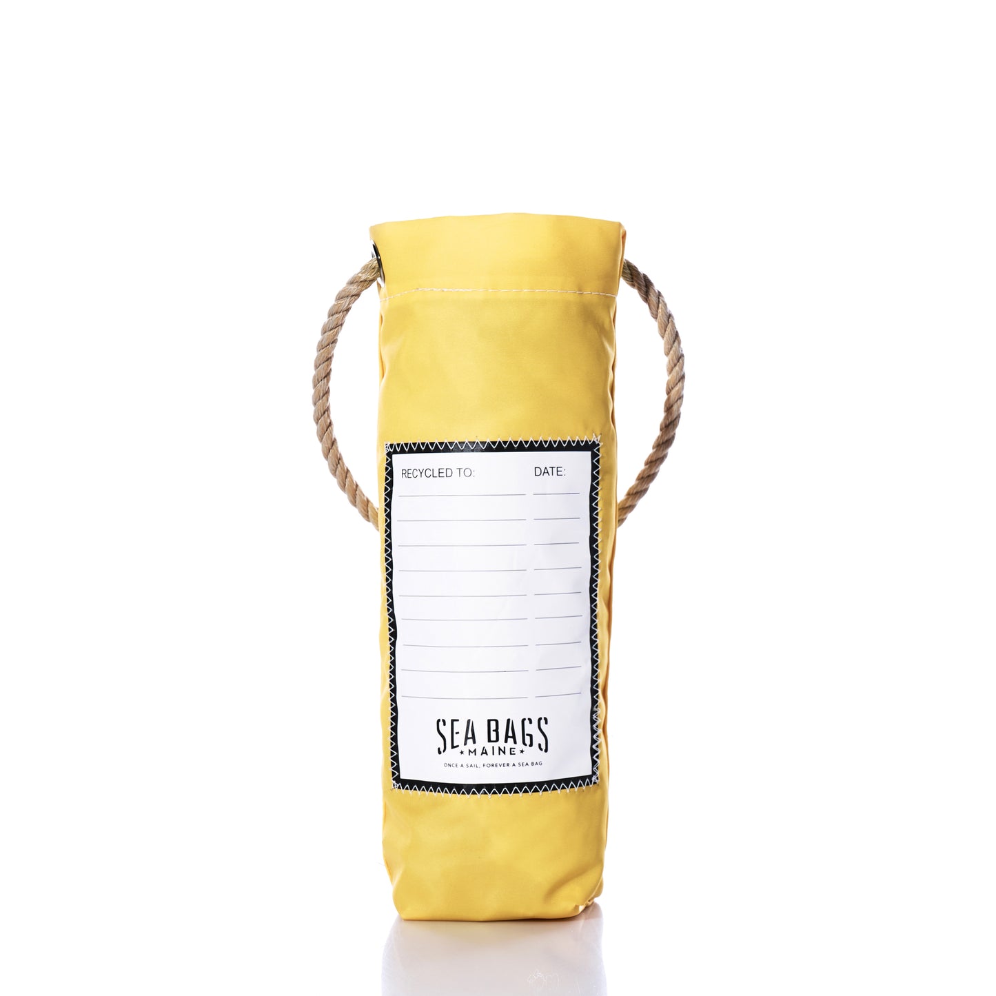 The Butter Wine Bag by Sea Bags is a yellow cylindrical wine bag with a rope handle, crafted from recycled sail cloth. It features a white label on the front that reads SEA BAGS MAINE, along with blank spaces for RECYCLED TO and DATE. The bag is photographed against a white background. by Sea Bags