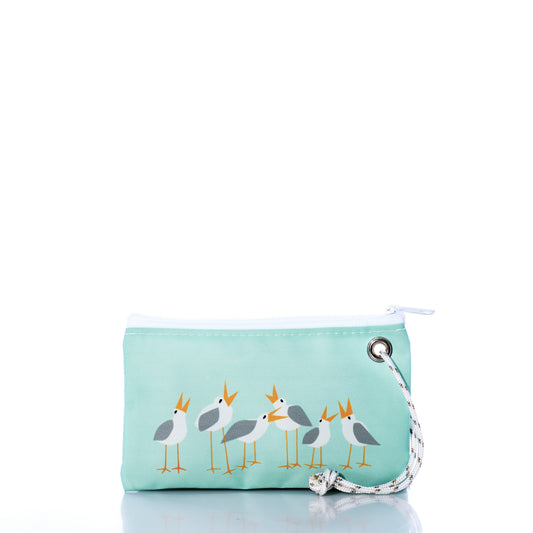 Introducing the Wharf Gulls Wristlet by Sea Bags—a small aqua zippered pouch crafted from recycled sail cloth and adorned with a playful print of five cartoon seagulls. Designed by Kate Nelligan, this charming accessory features white trim, a white cord with a metal grommet on the right side, and is showcased against a white background. by Sea Bags