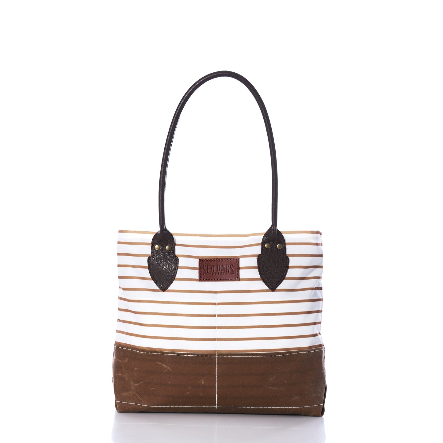 Introducing the Tan Chebeague Stripe Handbag from Sea Bags—a nautical-inspired tote crafted from recycled sail cloth. This stylish bag features a brown base and handles, with horizontal beige and white stripes adorning the upper section. Finished with a small leather patch on the front, it offers a timeless touch of classic charm inspired by Chebeague Island. by Sea Bags