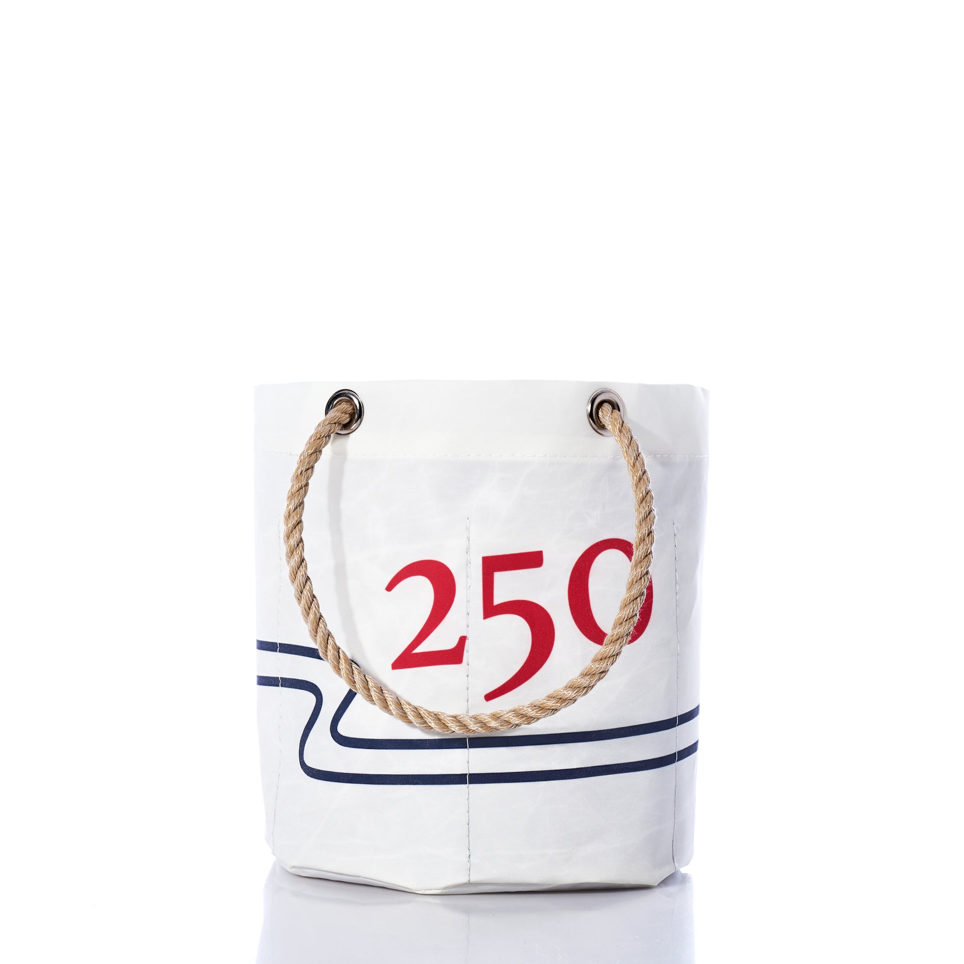 Handcrafted in Maine from recycled sail cloth, the Sea Bags 250th Patriotic Beverage Bucket Bag features a white bucket-style design with sturdy rope handles, accented by a bold red 250 and blue lines as part of the USA 250 Collection. The bag is displayed against a white background. by Sea Bags
