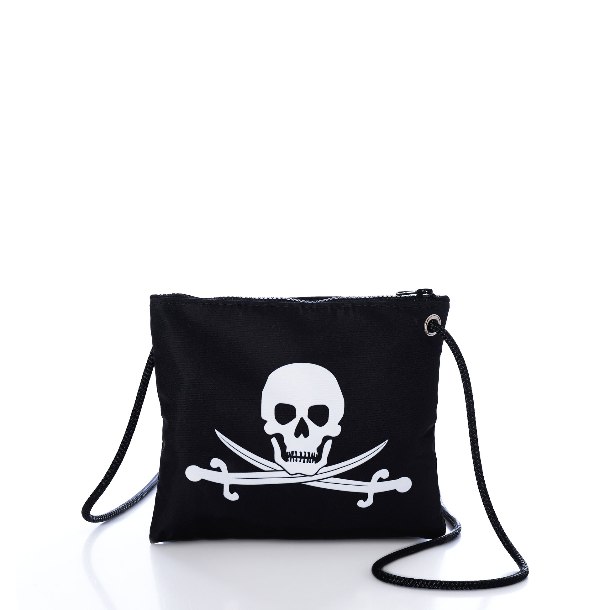 Sea Bags Jolly Roger Slim Crossbody—a black zippered pouch made from recycled sailcloth, featuring a rope strap and a bold white skull and crossed swords graphic on the front, shown against a white background. by Sea Bags