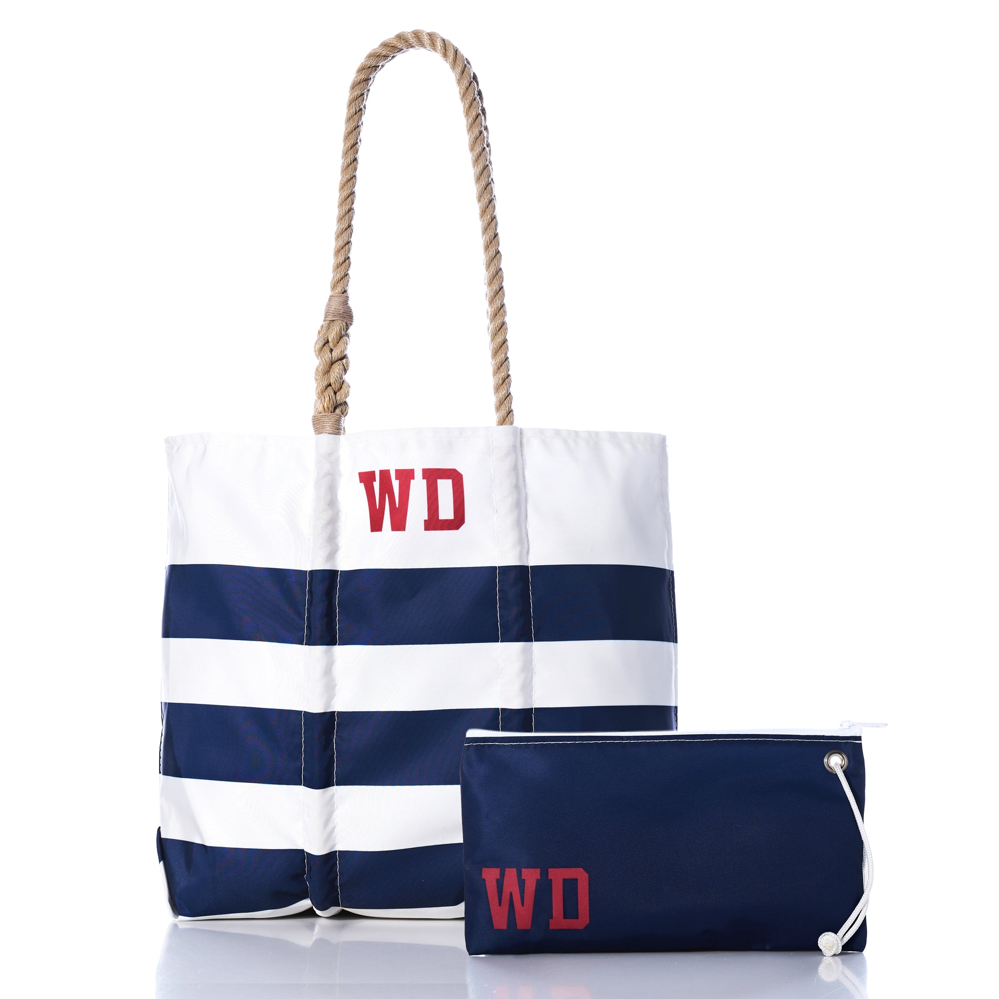Sea Bags Custom Monogram Breton Stripe Medium Tote  Large Wristlet Bundle, featuring navy and white stripes with rope handles, both adorned with red WD monograms, crafted from recycled sailcloth for sustainability, displayed on a white background.