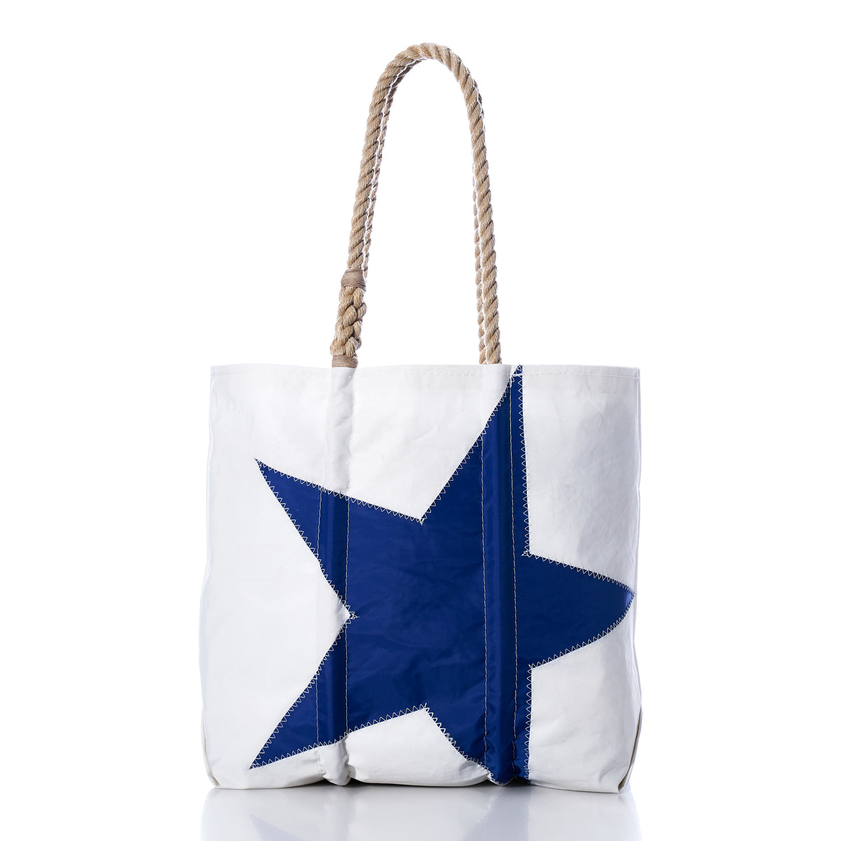 Limited edition Royal Blue Star Medium Tote by Sea Bags, featuring a bold blue star design, signature rope handles, and visible stitching, handcrafted and displayed on a white background.