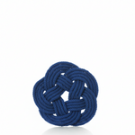 A set of four Nautical Sailor Knot Coasters Cobalt by true is displayed against a plain white background, each featuring a neatly tied blue Turk’s head knot in a round, intricate pattern with a subtle reflection below.