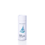 A white cylindrical container labeled “Shore Soap Co. Smooth Sailing Eco-Friendly Body Balm Stick,” featuring a sailboat illustration on the front, sits against a white background. This pocket-sized balm offers instant, eco-friendly hydration for dry skin whenever you need on-the-go relief.