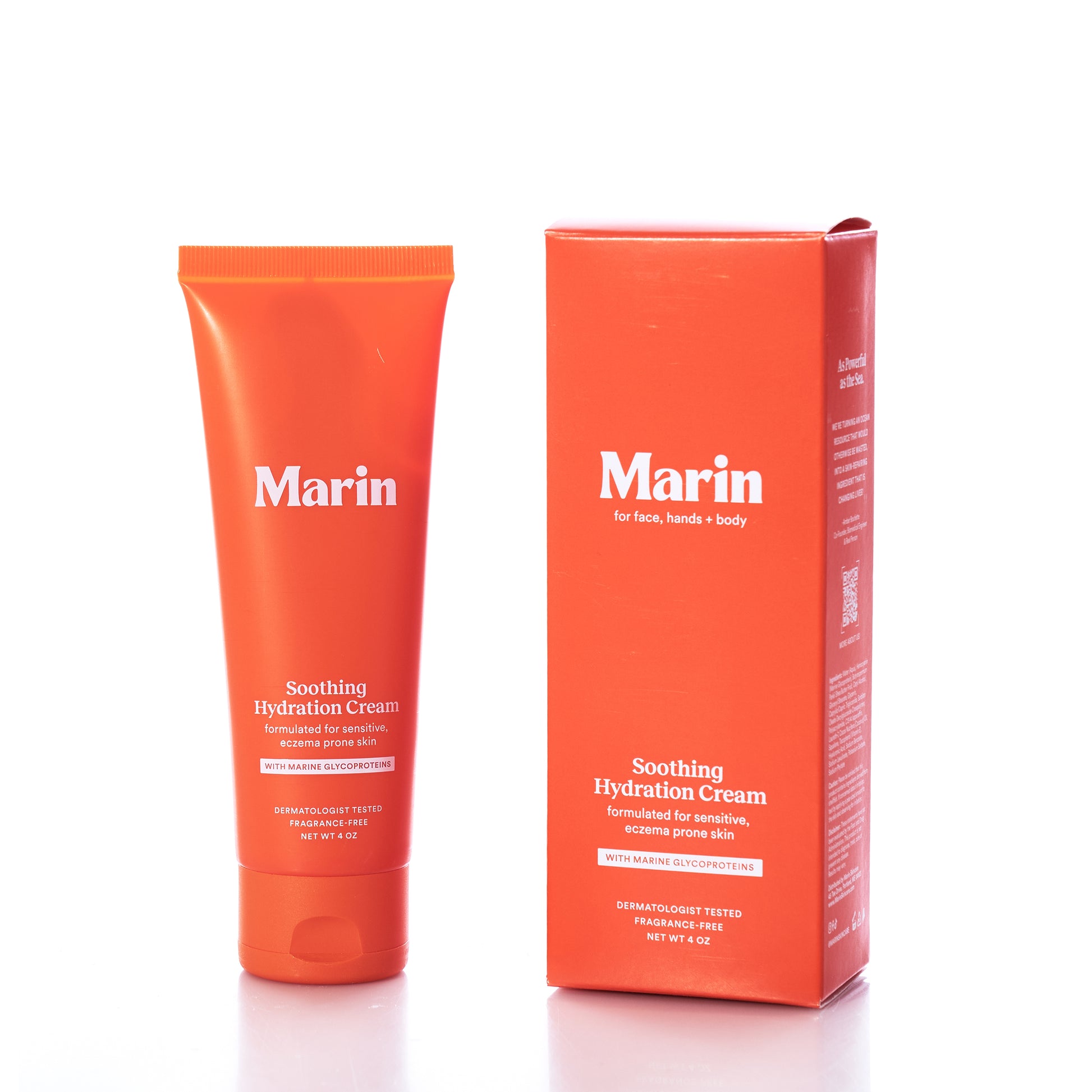 The orange tube of Marin Skincare Soothing Hydration Cream stands beside its matching box, both products from Marin Skincare designed for use on the face, hands, and body. Specially formulated for sensitive and acne-prone skin, this hydration cream delivers essential barrier support to promote effective skin repair.