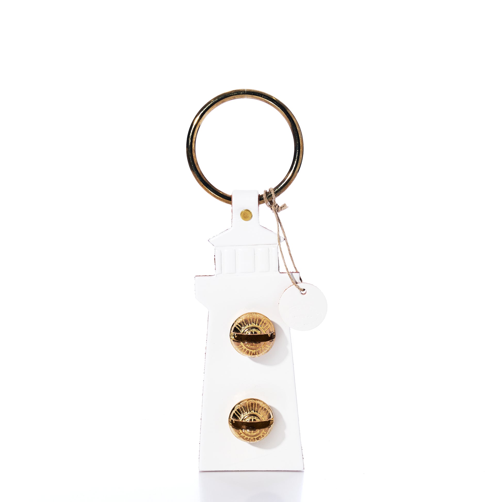 A White Lighthouse Door Chime keychain from true, featuring a gold keyring and two gold dials on the front, reminiscent of a New England Bells lighthouse door chime, photographed against a white background.