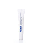 A white tube labeled Marin Skincare stands upright on a white background. The text indicates it is the Marin Lip Treatment - Unscented with marine glycoproteins and a net weight of 0.5 oz, offering a deeply hydrating formula for smooth, nourished lips.