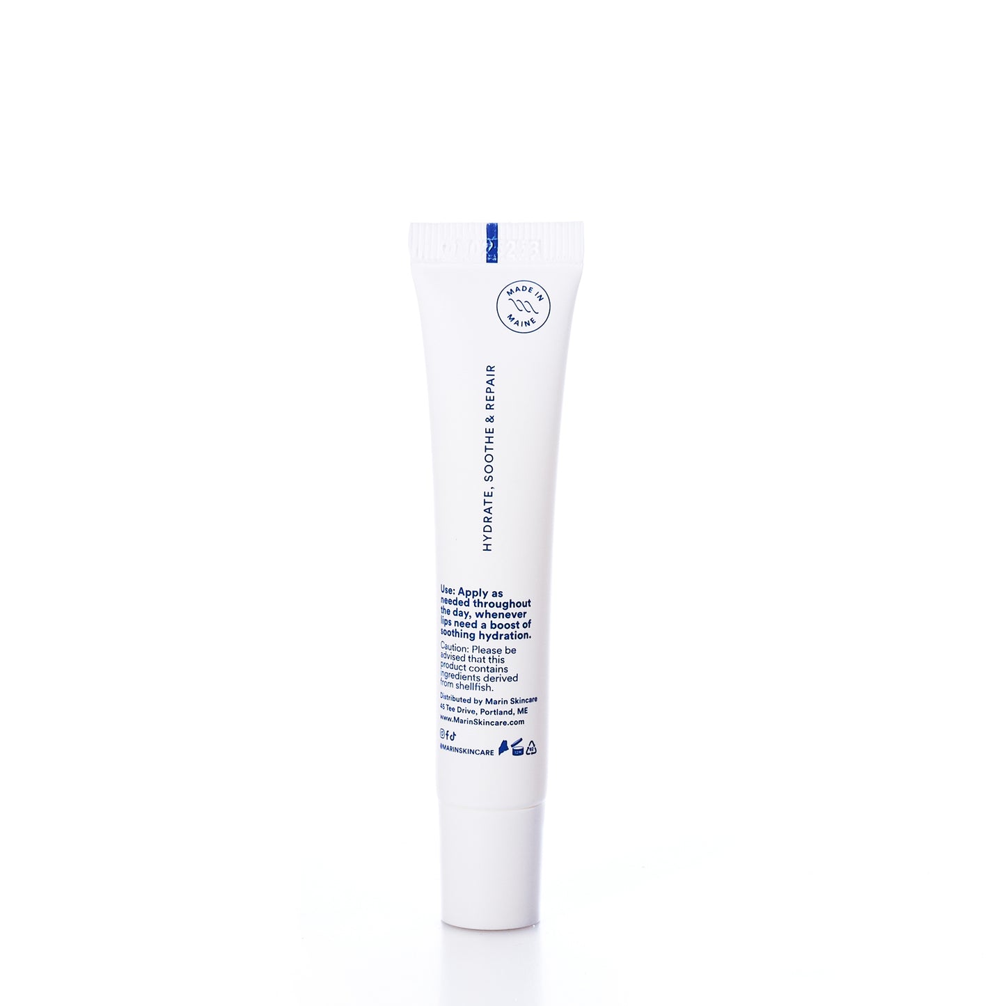 A white tube of Marin Skincare’s Marin Lip Treatment – Unscented stands upright on a white background; blue text and icons are visible on the front, emphasizing this deeply hydrating lip treatment formulated with Marine Glycoproteins.