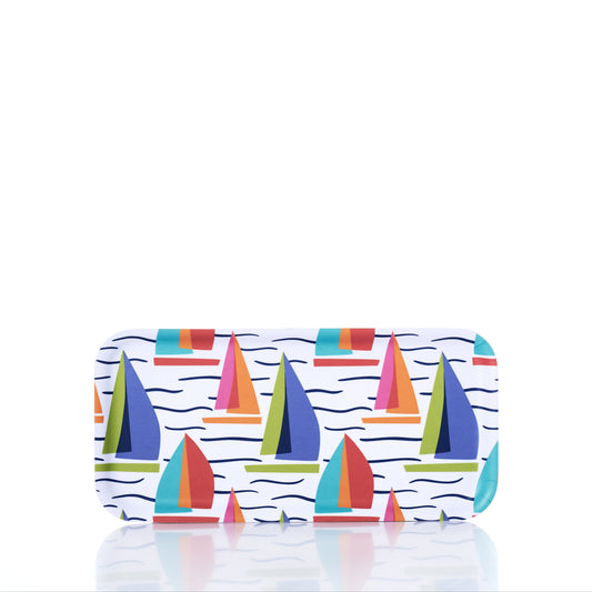 The Kate Nelligan Full Sail Tray by Trays4Us features colorful sailboat illustrations and wavy lines on a white background, expertly crafted from Scandinavian birch in Finland, and is shown photographed against a plain white surface. by Sea Bags