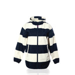 The Harborside Waterproof Raincoat - Stripe Navy  White from True is a women’s hooded jacket with a white and navy stripe pattern, featuring a waterproof shell, front zipper, two side pockets, and elastic cuffs. It is displayed on a white background.