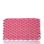 The Fisherman Rope Mat in Red, Pink,  White by Advanced Industrial Solutions Inc features a rectangular design with thick, interlaced strands in pink and white tones and a glossy finish—evoking the eco-friendly charm and cottage-core appeal of a woven clutch. by Sea Bags