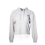 The Ribbed Hoodie Pullover - Oatmeal Anchor by Soft As A Grape features a light oatmeal ribbed texture, drawstrings, and a small navy anchor logo on the left chest. Displayed on a plain white background, this coastal style pullover offers a relaxed yet refined look that’s perfect for layering throughout the year. by Sea Bags