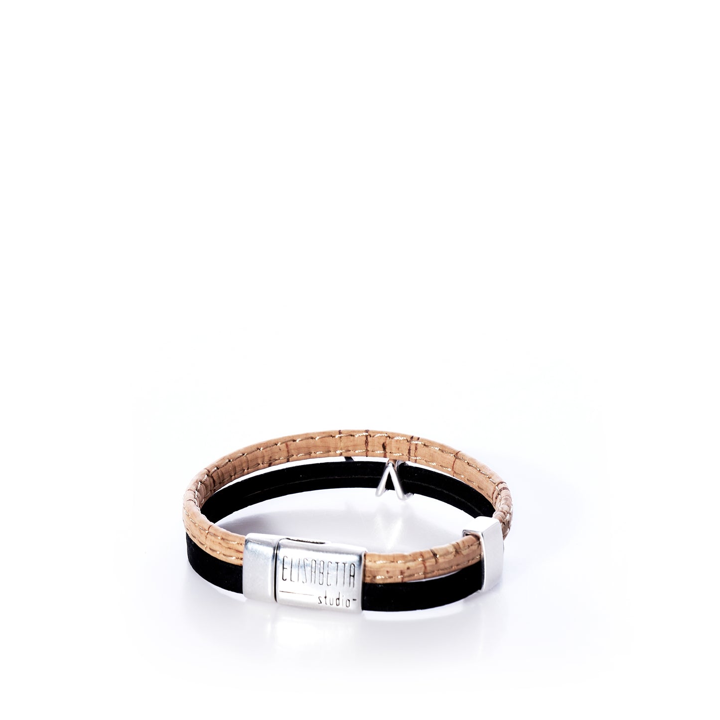 The Classic Cork Bracelet - Shark on Black by Elisabetta Studio features brown and black Portuguese cork with an antique silver shark magnetic clasp engraved with the brand name, shown against a white background. by Sea Bags