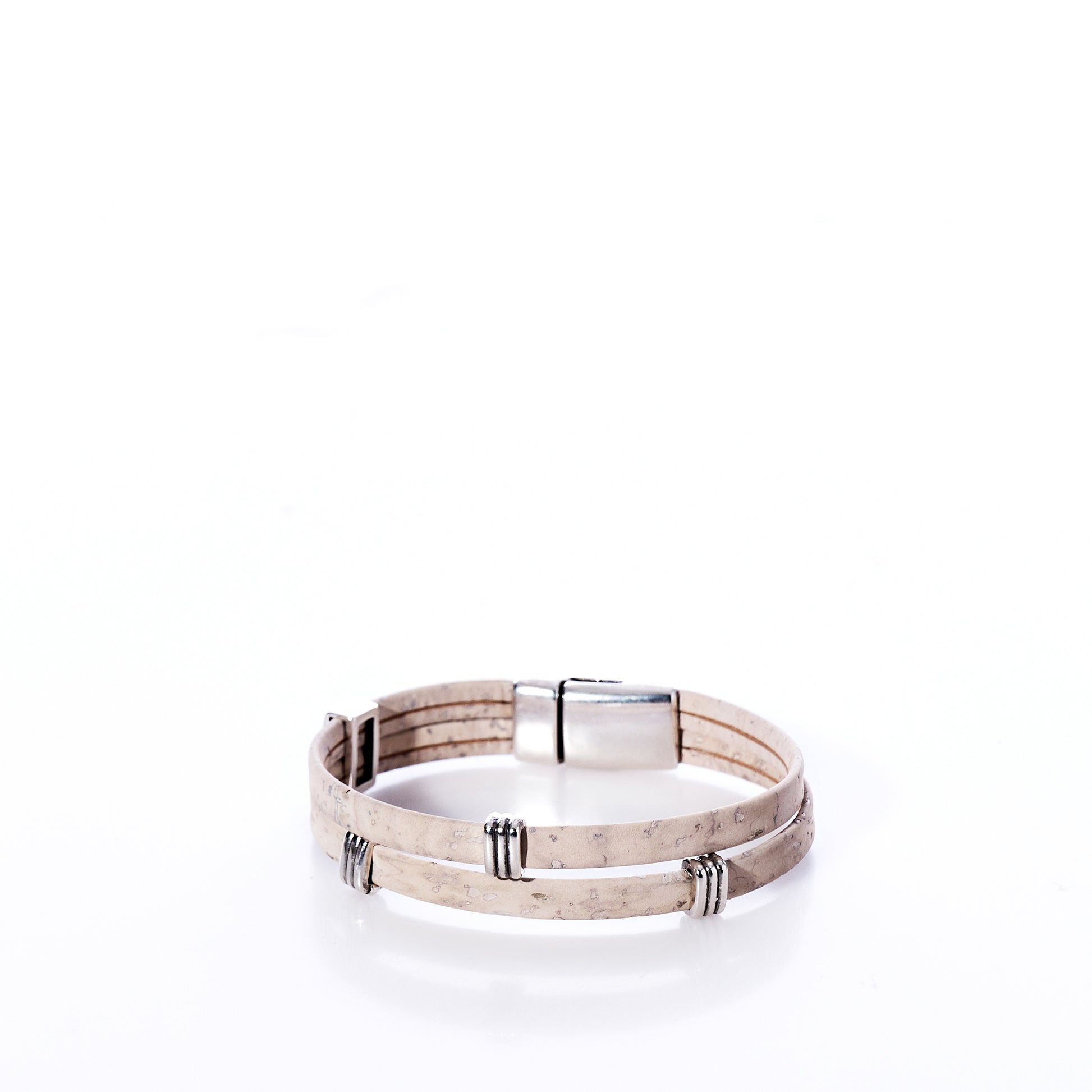 Classic Cork Bracelet - Stripe Bands on White by Elisabetta Studio, featuring a tan double-wrap eco-friendly cork leather band with silver clasp and silver accent rings, handcrafted in Vermont and displayed on a white background. by Sea Bags