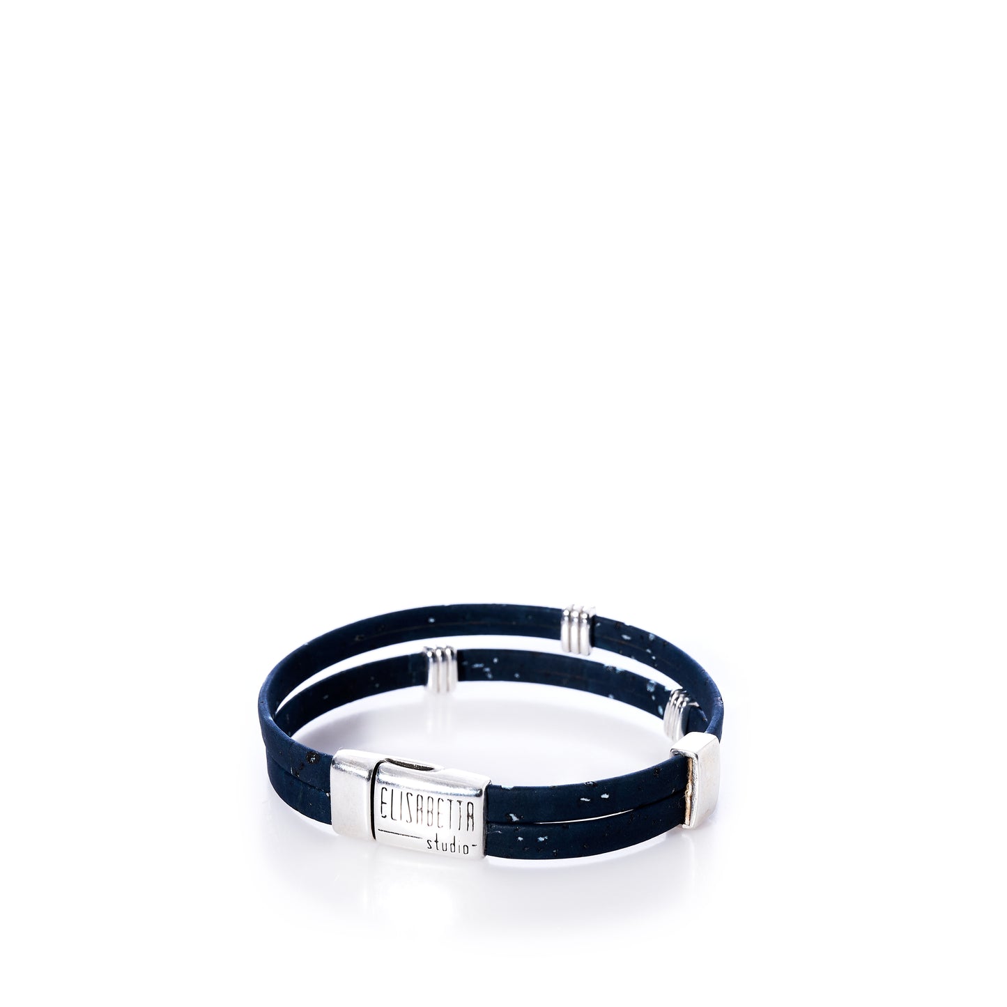 Classic Cork Bracelet - Stripe Bands on Navy by Elisabetta Studio features black double bands of Portuguese cork with silver accents and a rectangular magnetic clasp engraved with the Elisabetta Studio logo, displayed on a white background. by Sea Bags