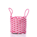 The Fisherman Rope Basket - Pink  White by Advanced Industrial Solutions Inc features two looped handles and is handwoven in Maine from eco-friendly materials, shown here on a white background. by Sea Bags