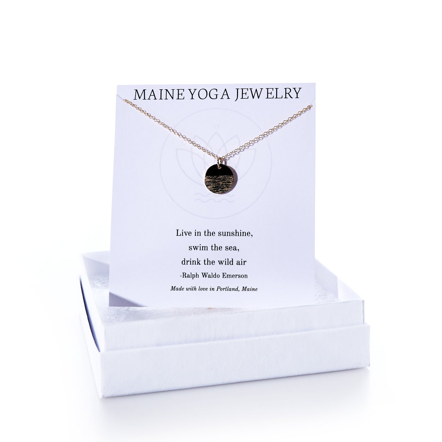 Introducing the Pendant Necklace - Horizon Gold by Maine Yoga Jewelry: this elegant gold pendant necklace features a meaningful Emerson quote on its display card and comes packaged in a white box labeled Maine Yoga Jewelry, making it a beautiful addition to any jewelry collection. by Sea Bags