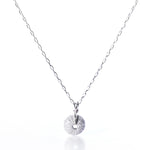 Pendant Necklace - Tiny Sea Urchin Silver by Maine Yoga Jewelry, featuring a delicate silver chain and a handcrafted circular pendant inspired by a sea urchin, adorned with small white gemstones, shown on a white background. by Sea Bags