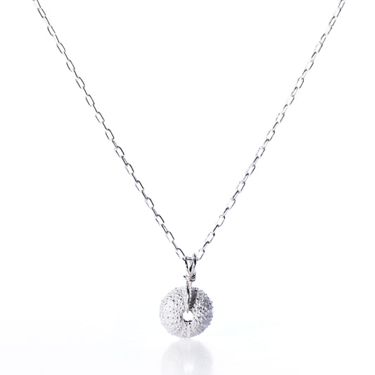 Pendant Necklace - Tiny Sea Urchin Silver by Maine Yoga Jewelry, featuring a delicate silver chain and a handcrafted circular pendant inspired by a sea urchin, adorned with small white gemstones, shown on a white background. by Sea Bags