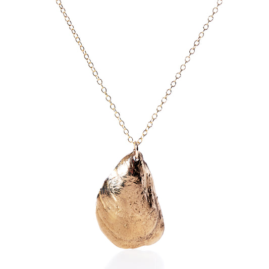 Pendant Necklace - Large Mussel Bronze by Maine Yoga Jewelry shown against a white background—a stunning piece of coastal jewelry featuring a textured bronze mussel pendant, perfect for seaside-inspired style. by Sea Bags