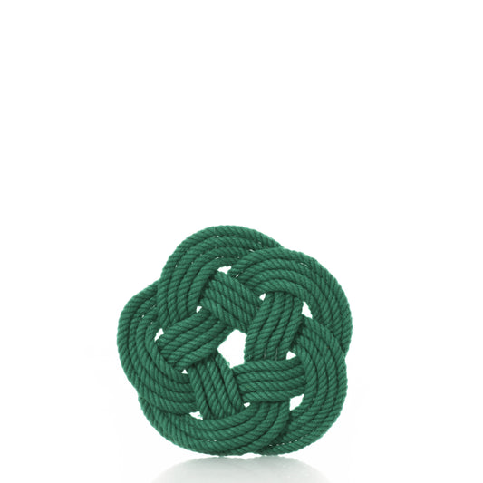 A set of four green Nautical Sailor Knot Coasters by Mystic Knotwork, featuring decorative circular knots with interwoven loops, is displayed against a white background. by Sea Bags
