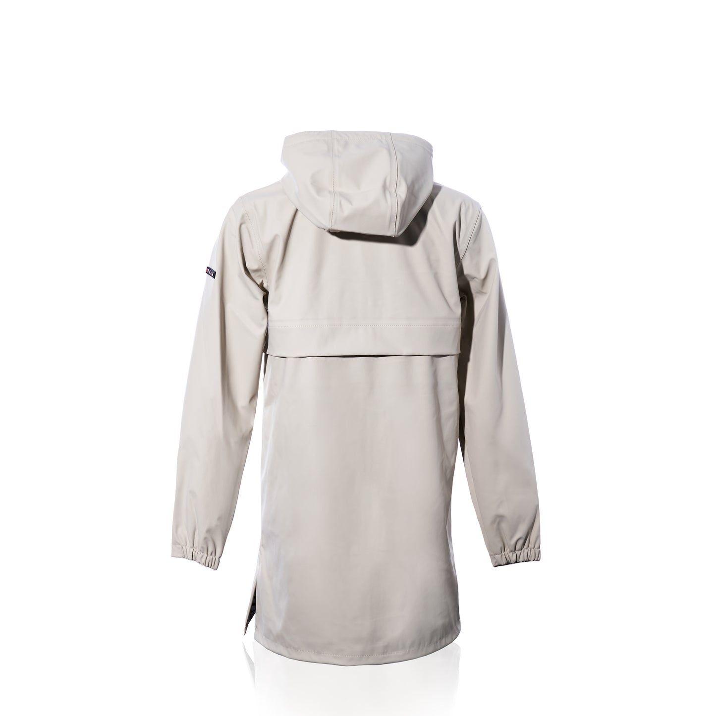 The Harborside Waterproof Raincoat - Moonstruck by true is displayed from the back, featuring a light gray unisex design with long sleeves, a vented yoke, and a logo patch on the upper left arm. Crafted from a waterproof shell, it is photographed against a white background.