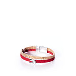 The Classic Cork Bracelet - Claw on Red by Elisabetta Studio features Portuguese cork and red leather, a magnetic nickel-free clasp, and a round silver accent, all displayed against a white background. by Sea Bags