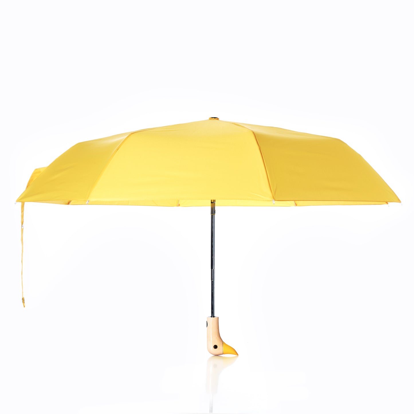 A fully opened Original Duck Head Umbrella - Yellow by ODH Limited t/a Original Duckhead, featuring a black shaft and a light wood handle, is photographed against a plain white background. This PFAS free, recycled umbrella combines sustainable materials with timeless style. by Sea Bags