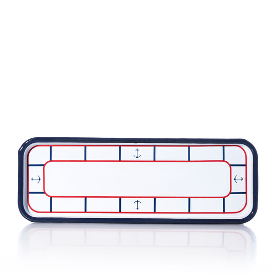The Enamel Anchor Serving Tray by Batela USA Inc features a rectangular white design with a navy blue rim and a red and blue nautical anchor motif on enameled metal, bringing coastal charm to any setting.
