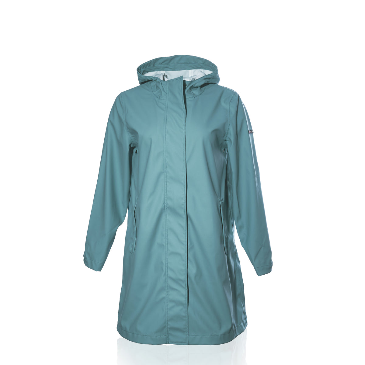 The Harborside Waterproof Raincoat - Tourmaline by Batela USA Inc is a light blue, knee-length coat with long sleeves and a front zipper, shown on a plain white background.
