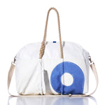 Sea Bags Vintage Blue 9 Weekender, featuring a vintage blue circular design, rope handles, and a beige shoulder strap, displayed on a white background. by Sea Bags