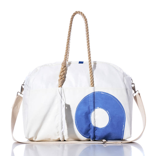 Sea Bags Vintage Blue 9 Weekender, featuring a vintage blue circular design, rope handles, and a beige shoulder strap, displayed on a white background. by Sea Bags