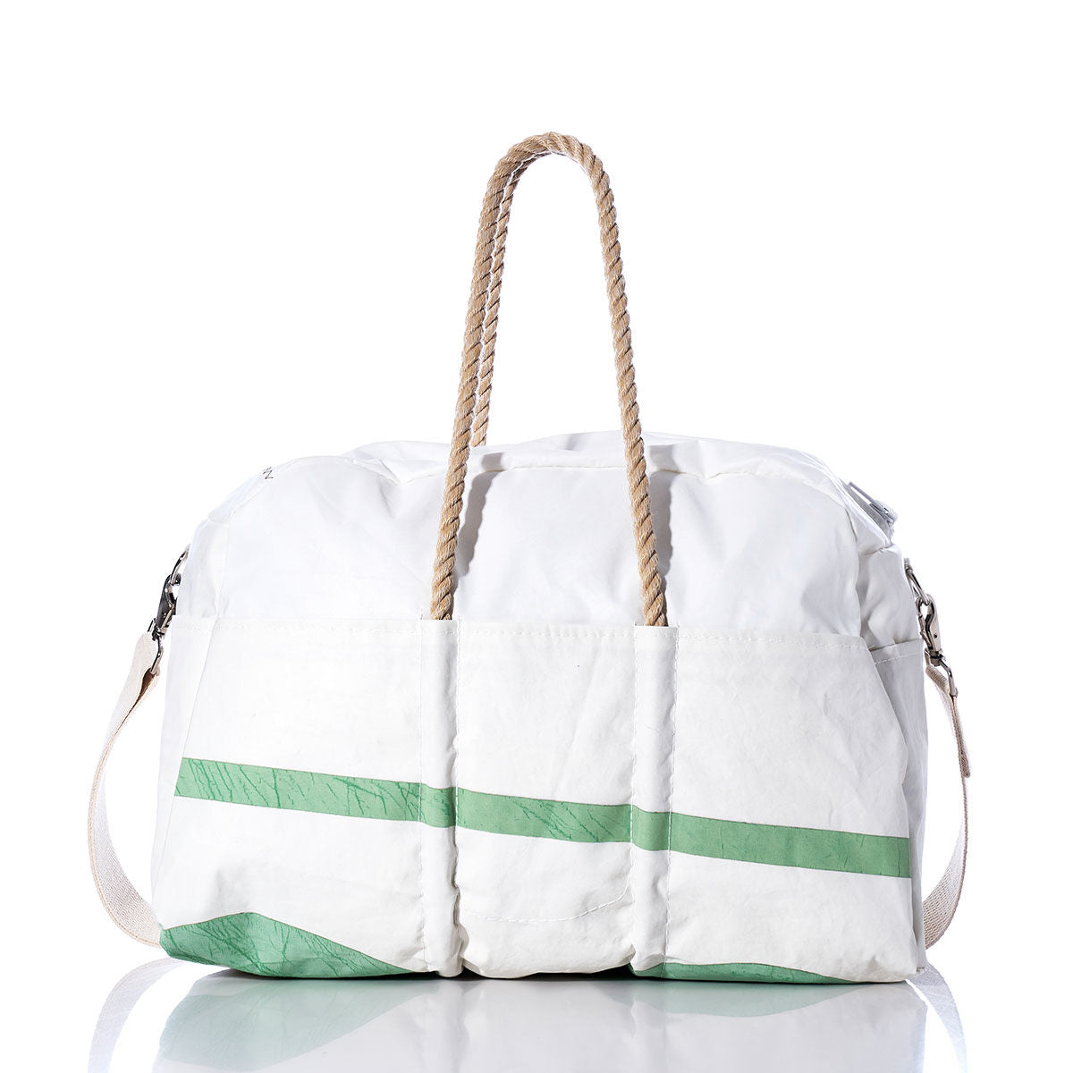 Sea Bags Vintage US Weekender—this white duffle bag features green diagonal stripes, rope handles, and a removable shoulder strap, beautifully displayed on a reflective surface against a white background—an ideal choice for your next stylish getaway. by Sea Bags