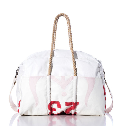 The Sea Bags Vintage Ericson 23 Weekender features a white design with red accents, hemp rope handles, and a pink shoulder strap, photographed on a white background—ideal for use as a stylish vintage weekender or getaway bag. by Sea Bags