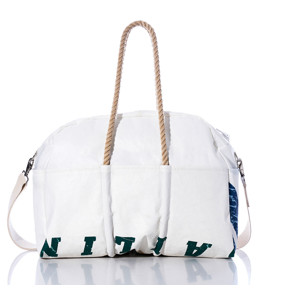 The Sea Bags Vintage Salve Sailing Weekender is a white duffel bag with hemp handles, a side strap, and green printed letters along the bottom edge, photographed against a white background—perfectly styled for your next getaway. by Sea Bags