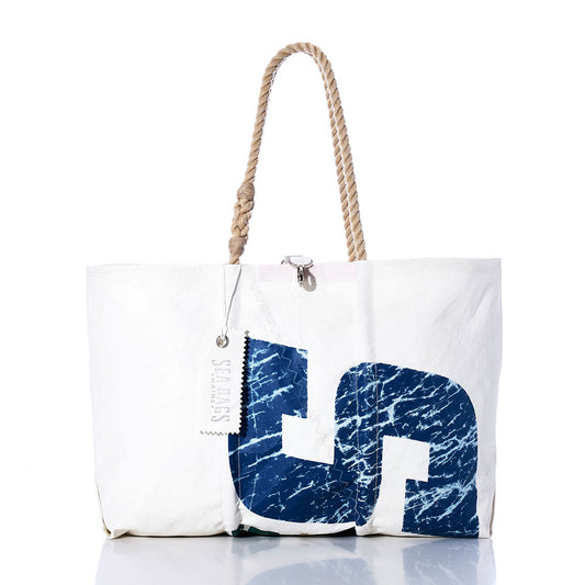 Sea Bags Vintage Sailing Large Tote featuring original sail insignia, hand-spliced rope handles, and a blue nautical graphic on white—with a SEABAGS tag, set against a white background. by Sea Bags